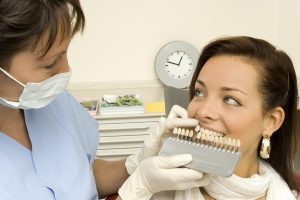 Comparing Dental Implants and Dentures