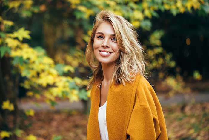 young girl smiling outdoors