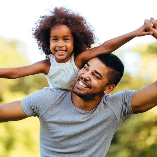 man and daughter having fun